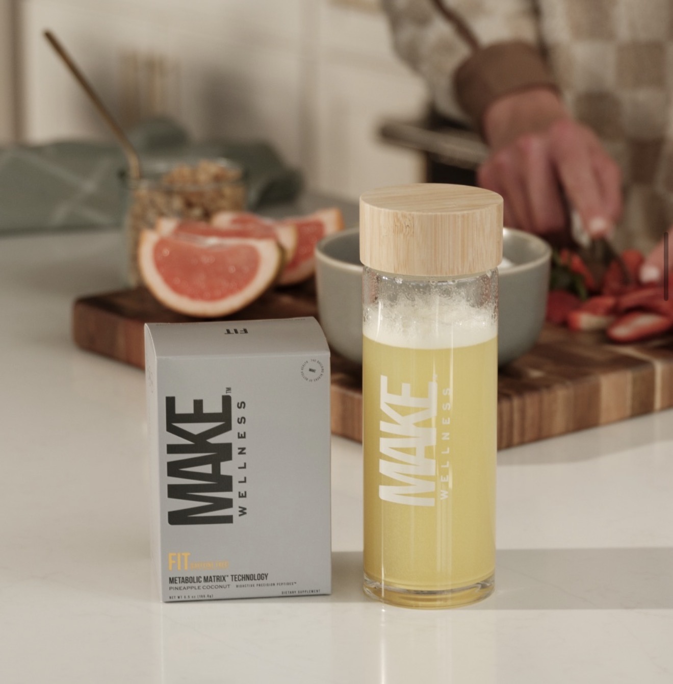 MAKE peptide drink in glass bottle on kitchen counter